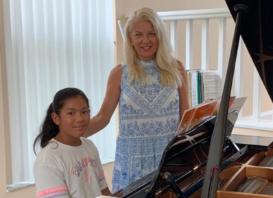 piano teacher and student